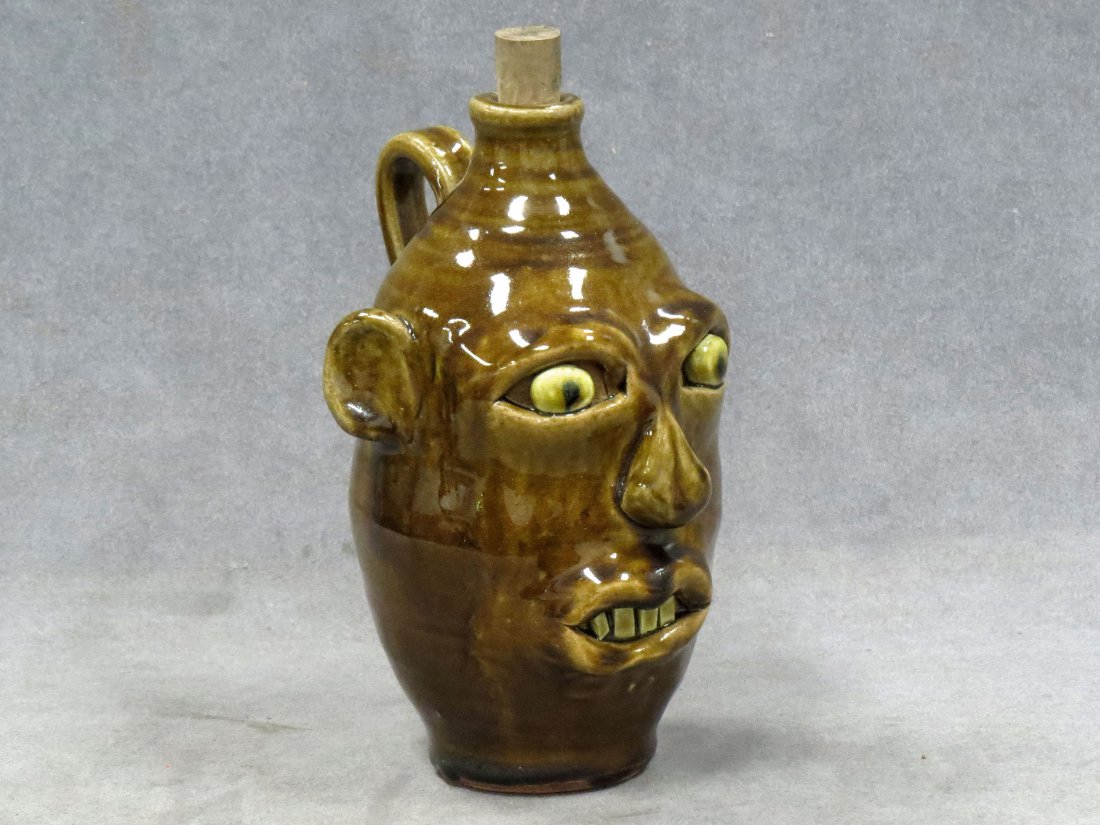 ANITA MEADERS SOUTHERN FOLK ART POTTERY FACE JUG: ANITA MEADERS SOUTHERN FOLK ART POTTERY FACE JUG, SIGNED. HEIGHT 8 1/4"