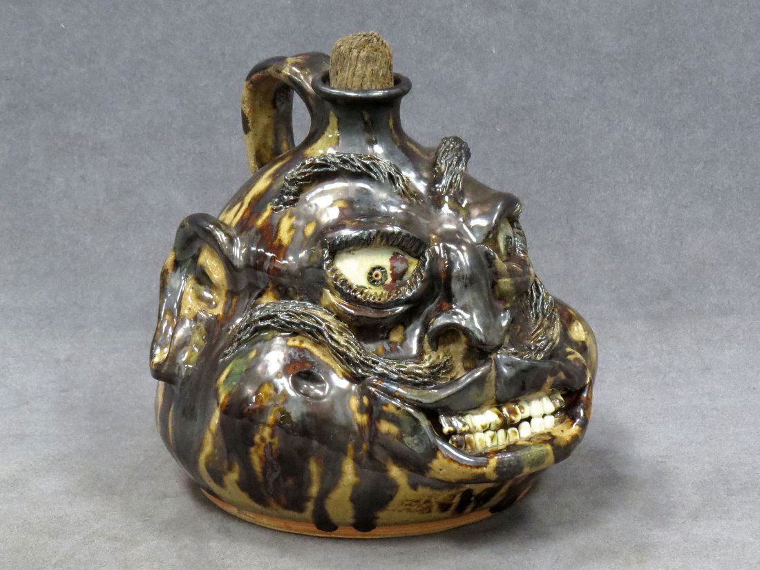 BILLY RAY HUSSEY (N.CAROLINA 1955-), FACE JUG: BILLY RAY HUSSEY (N.CAROLINA 1955-), SOUTHERN FOLK ART POTTERY FACE JUG, SIGNED XVIII. HEIGHT 7 1/2"