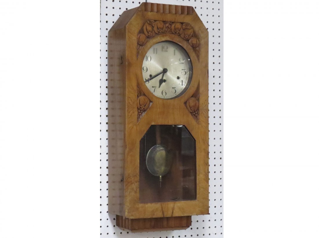 ART DECO KIENZLE (GERMAN) CARVED WALNUT CLOCK: ART DECO KIENZLE (GERMAN) CARVED WALNUT REGULATOR WALL CLOCK WITH WESTMINSTER CHIMES. HEIGHT 30 1/2"