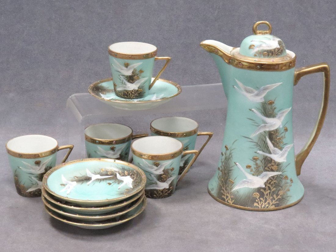 NIPPON HAND PAINTED AND JEWELED PORCELAIN: NIPPON HAND PAINTED AND JEWELED PORCELAIN HOT CHOCOLATE POT WITH CUPS/SAUCERS. HEIGHT POT 9 1/2"