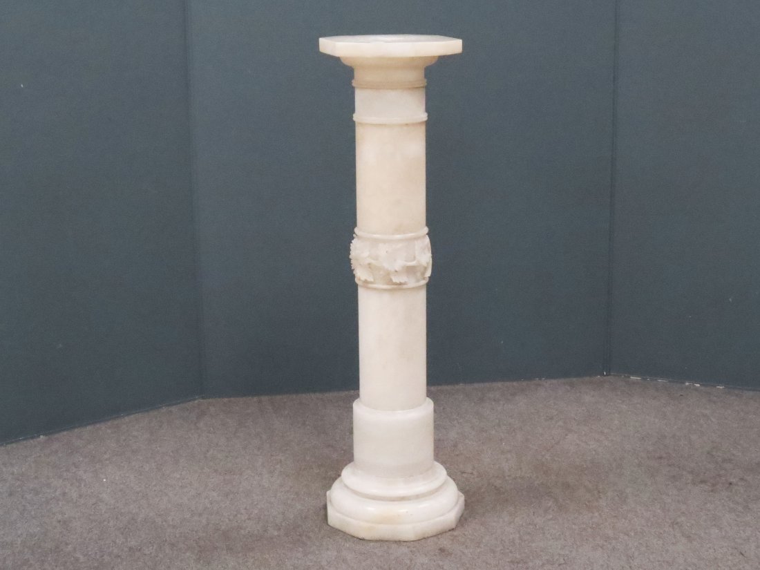 CONTINENTAL CARVED ALABASTER PEDESTAL: CONTINENTAL CARVED ALABASTER PEDESTAL. HEIGHT 42"