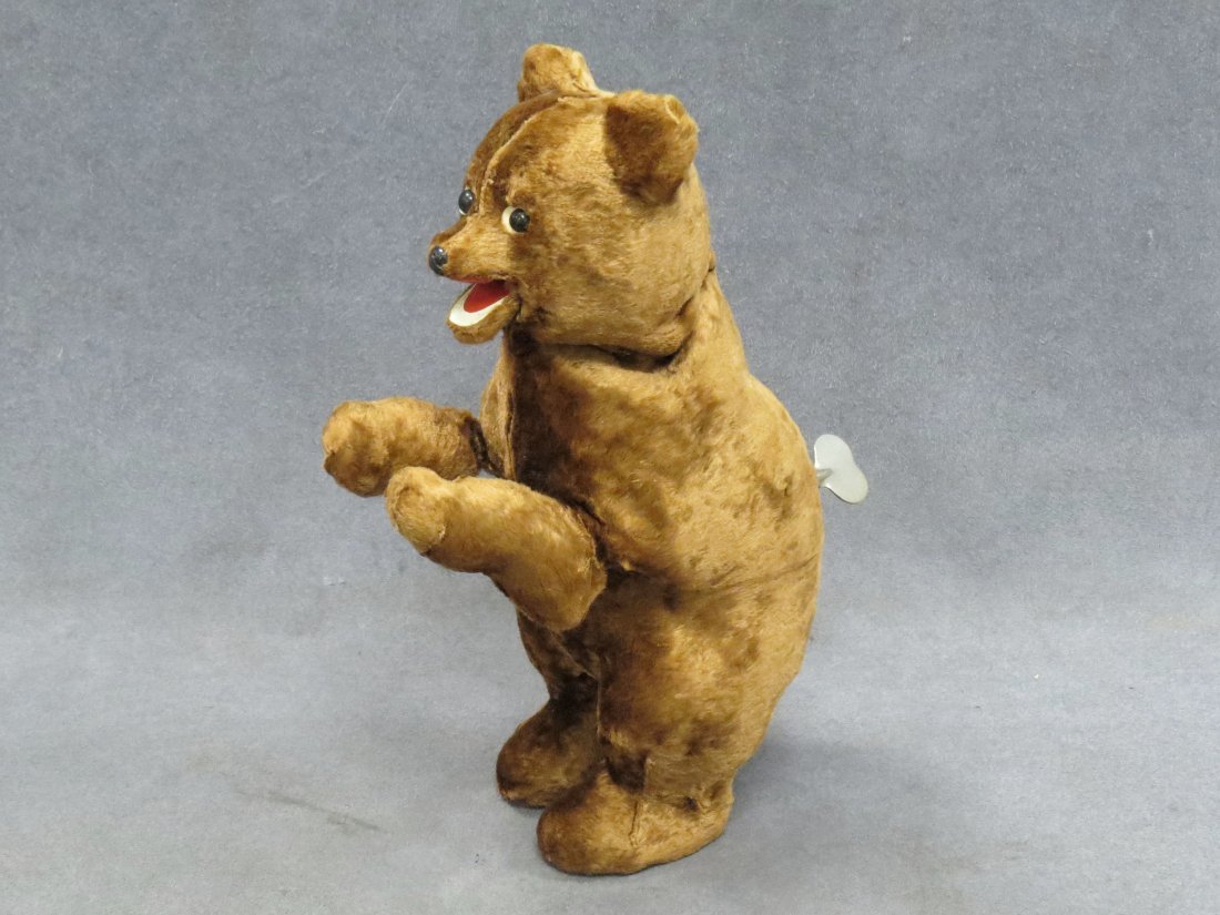VINTAGE WIND-UP DANCING BEAR PLUSH TOY: VINTAGE WIND-UP DANCING BEAR PLUSH TOY. HEIGHT 9 1/4"