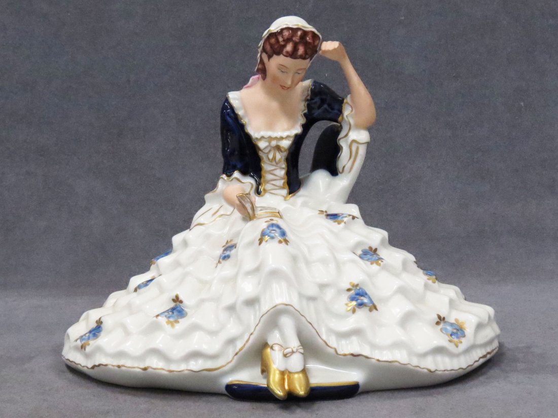 ROYAL DUX DECORATED PORCELAIN FIGURE: ROYAL DUX DECORATED PORCELAIN FIGURE OF A WOMAN READING, SIGNED. HEIGHT 7 1/2"