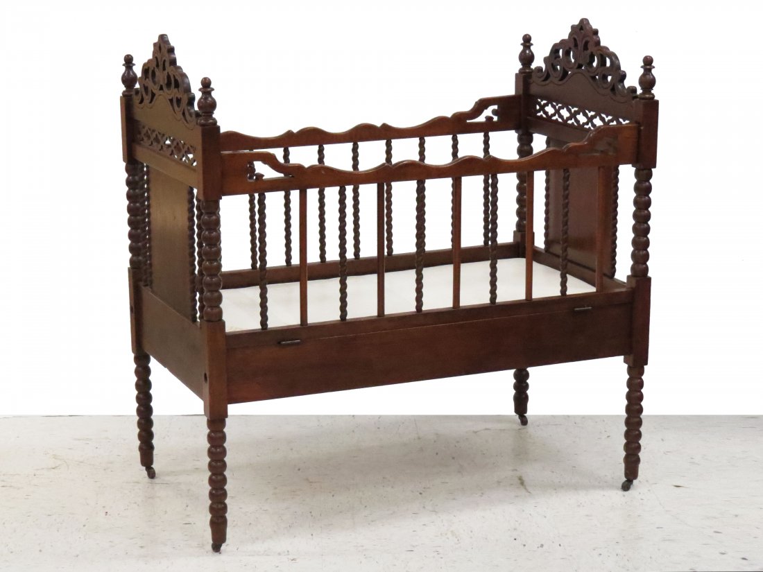 VICTORIAN CARVED WALNUT SPOOL TURNED YOUTH'S BED: VICTORIAN CARVED WALNUT SPOOL TURNED YOUTH'S BED, 19TH CENTURY. HEIGHT 50"; LENGTH 48"