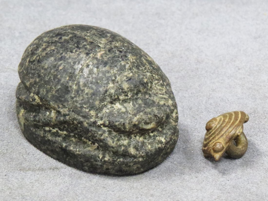 LOT (2) EGYPTIAN CARVED BASALT SCARAB: LOT (2) EGYPTIAN CARVED BASALT SCARAB AND ANCIENT BRONZE ORNAMENT. LENGTH 2 1/2" (The scarab is not inscribed)
