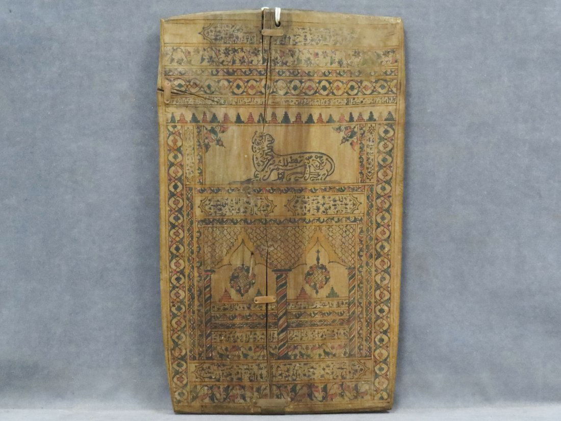 ANTIQUE ISLAMIC DECORATED WOOD PANEL: ANTIQUE ISLAMIC DECORATED WOOD PANEL, COMMEMORATING GRADUATION FROM KORAN SCHOOL, 19TH CENTURY. HEIGHT 24";