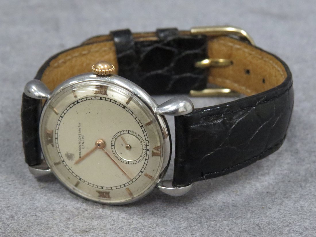 VINTAGE VACHERON AND CONSTANTIN WRISTWATCH: VINTAGE VACHERON AND CONSTANTIN STAINLESS MECHANICAL WRISTWATCH WITH FANCY LUGS, C.1950. 30MM