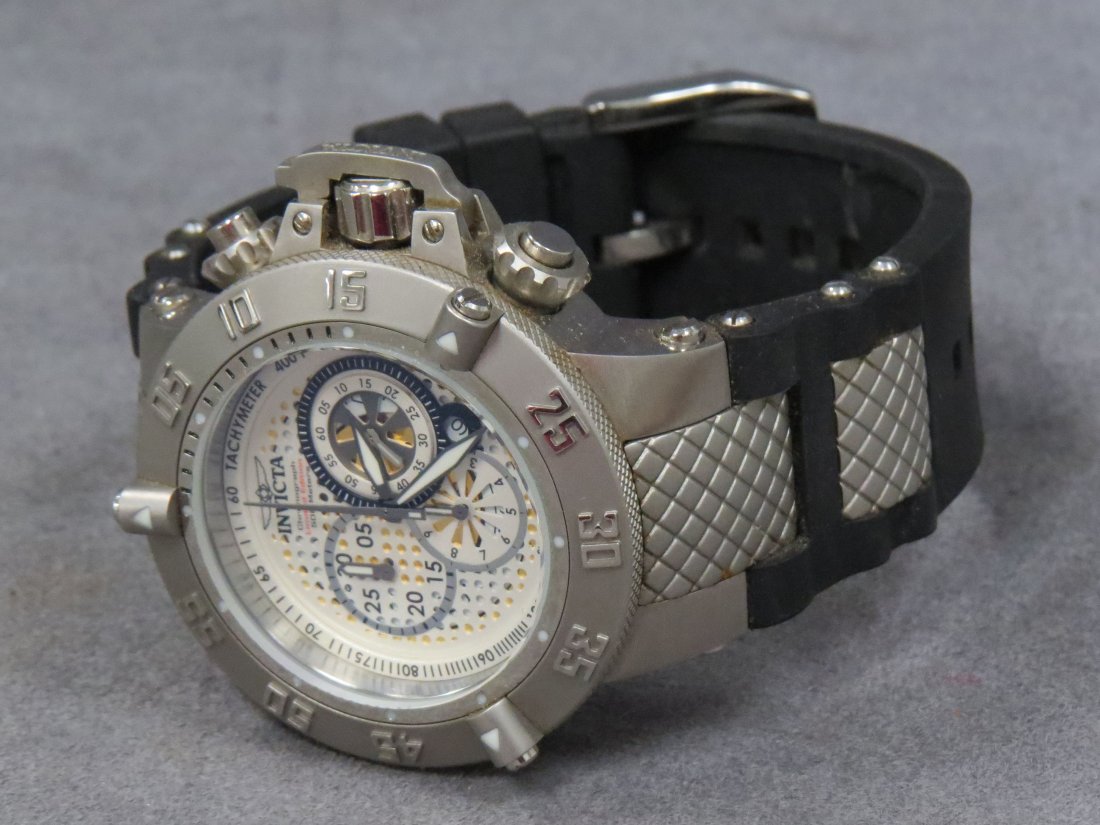 128. INVICTA STAINLESS AND RUBBER SUBAQUA WATCH: INVICTA STAINLESS AND RUBBER SUBAQUA NOMA III, MODEL 6044, SWISS QUARTZ CHRONOGRAPH WRISTWATCH. 50MM