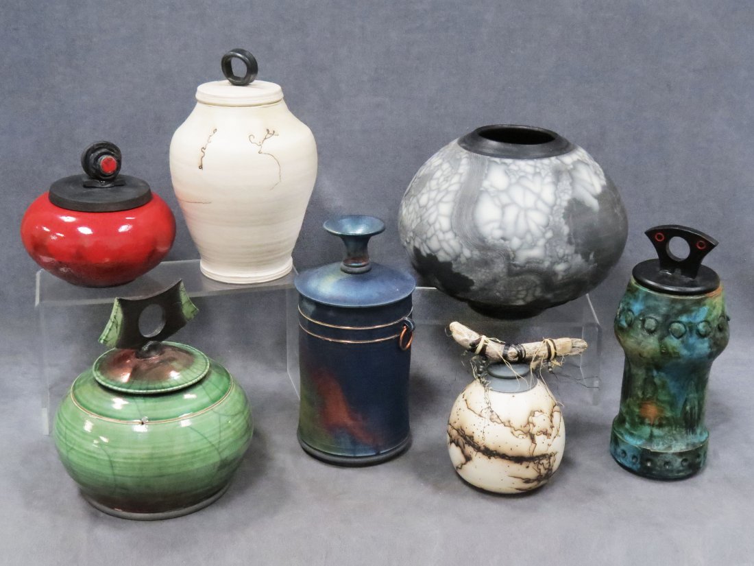 LOT (7) AMERICAN ART POTTERY: LOT (7) AMERICAN ART POTTERY INCLUDING (6) COVERED JARS AND (1) OVID BLACK AND WHITE DECORATED VASE, SIGNED. HEIGHT 6-10" (MINOR IMPERFECTIONS)