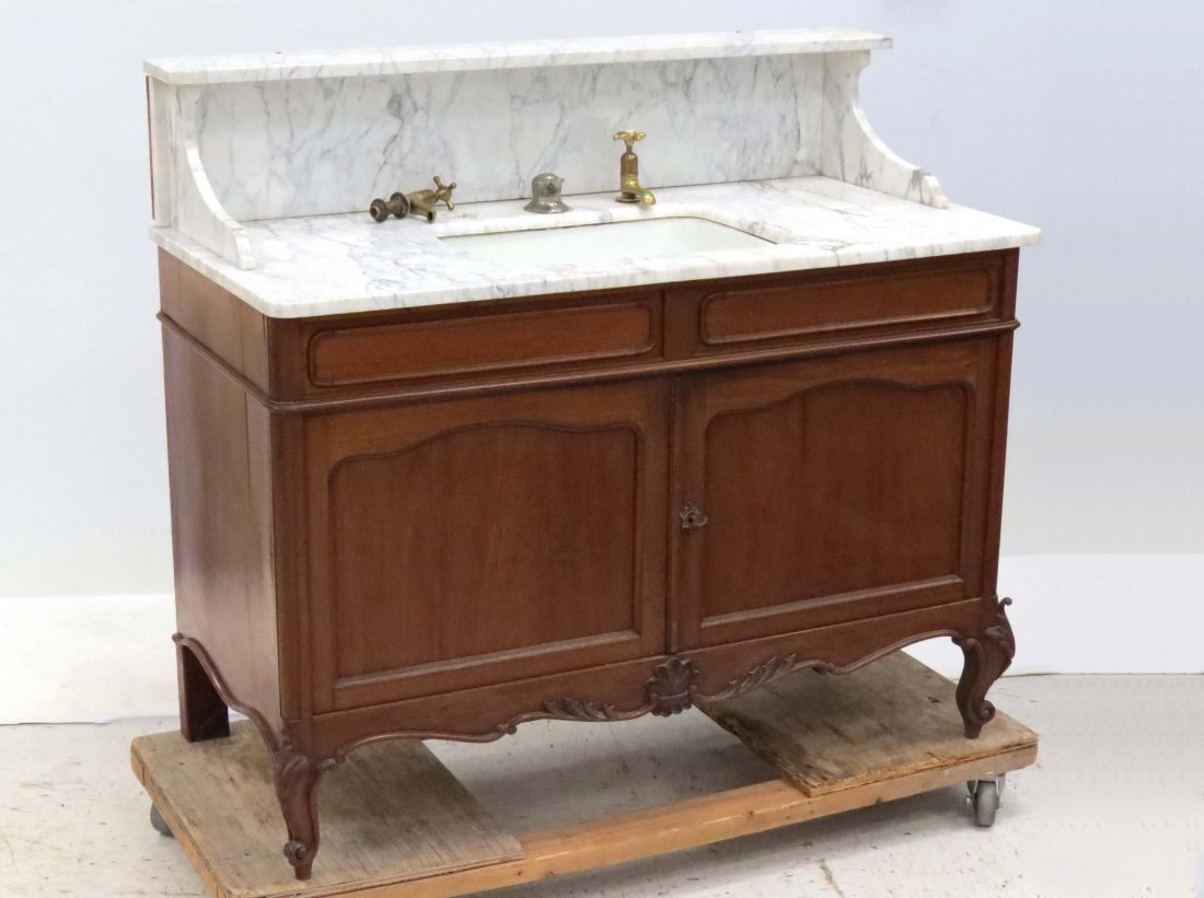 FRENCH PROVINCIAL WALNUT MARBLE-TOP COMMODE/SINK: FRENCH PROVINCIAL CARVED WALNUT MARBLE-TOP COMMODE/SINK, 19/20TH CENTURY. HEIGHT 43"; WIDTH 49"