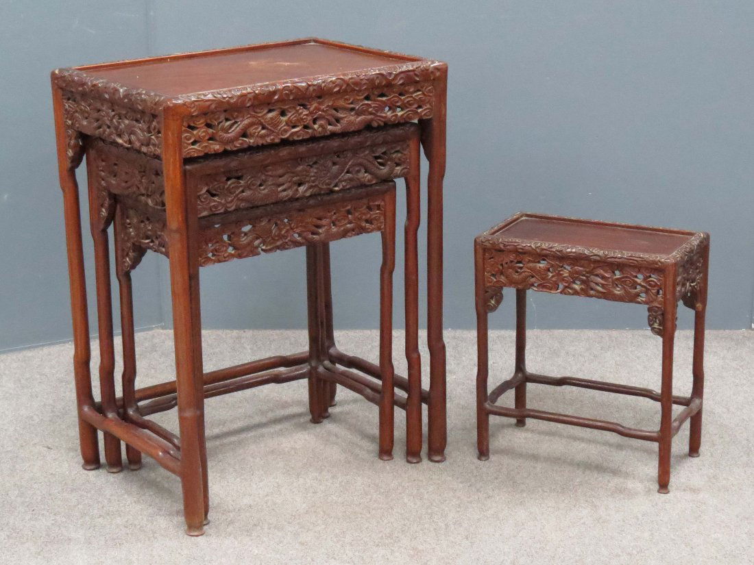 SET (4) CHINESE CARVED HARDWOOD NESTING TABLES: SET (4) CHINESE CARVED HARDWOOD NESTING TABLES. HEIGHT 26"; TOP 14 X 20" (LARGEST)