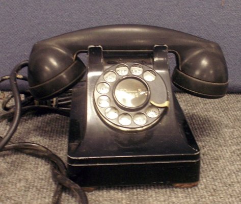VINTAGE BELL SYSTEM ROTARY CRADLE TELEPHONE: VINTAGE BELL SYSTEM ROTARY CRADLE TELEPHONE, C.1950