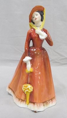 ROYAL DOULTON DECORATED PORCELAIN FIGURE, "JULIA": ROYAL DOULTON DECORATED PORCELAIN FIGURE, "JULIA", C.1974, HAND SIGNED BY MICHAEL DOULTON, 1977. HEIGHT 7 3/4"