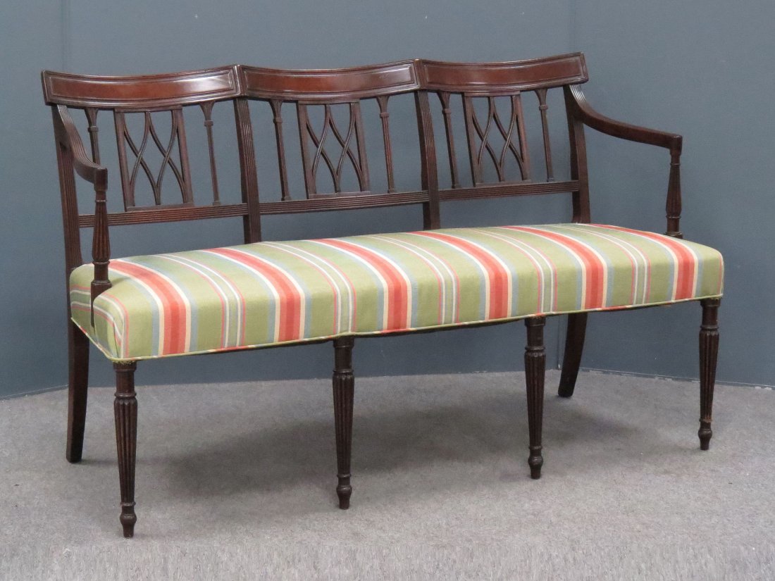 SHERATON CARVED MAHOGANY TRIPLE CHAIR-BACK SETTEE: SHERATON CARVED MAHOGANY TRIPLE CHAIR-BACK SETTEE. HEIGHT 32"; LENGTH 52"