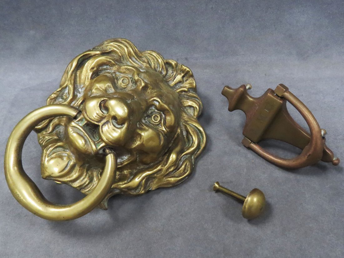 LOT (2) INCLUDING BRASS LION HEAD DOOR KNOCKER: LOT (2) INCLUDING BRASS LION HEAD DOOR KNOCKER, HEIGHT 9 1/2" AND ANOTHER. HEIGHT 6 1/2"