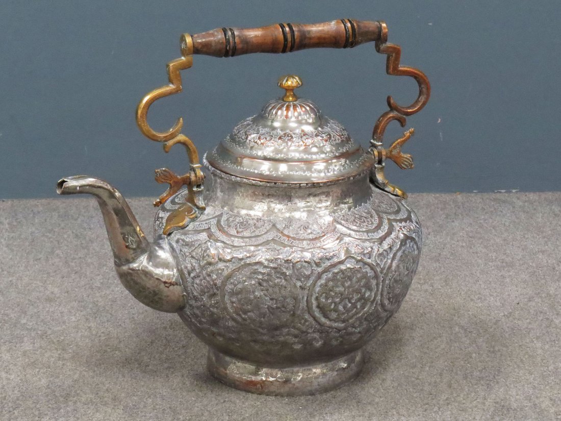 TURKISH REPOUSSE COPPER KETTLE WITH SILVER WASH: TURKISH REPOUSSE COPPER KETTLE WITH SILVER WASH AND BRASS MOUNTS, 19/20TH CENTURY. HEIGHT 14 1/2"