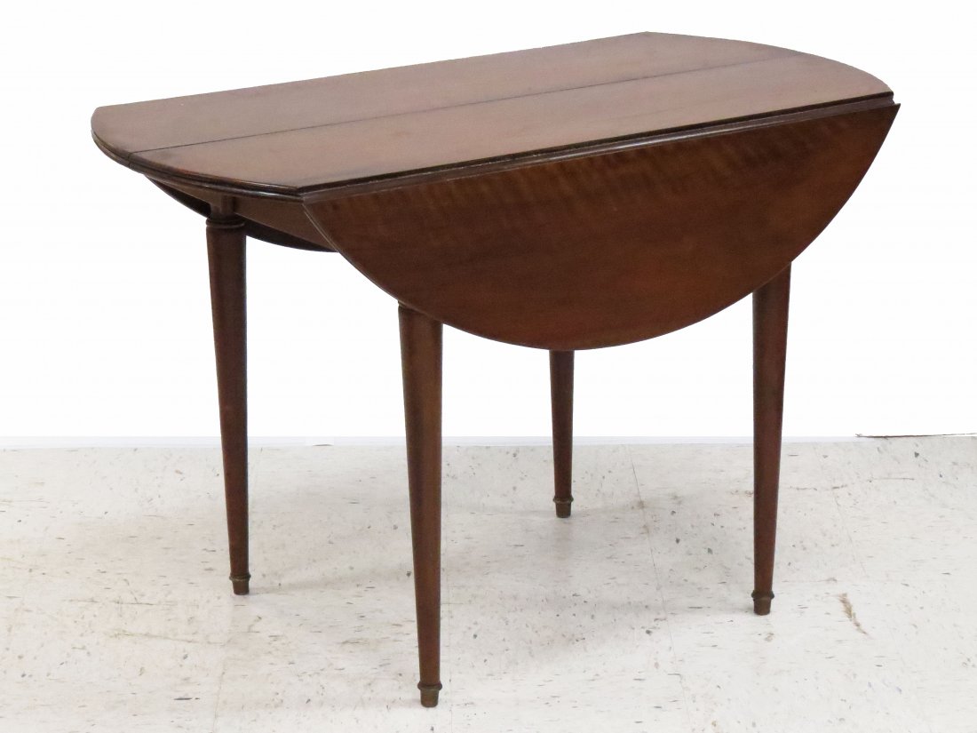 REGENCY STYLE WALNUT OVAL DINING TABLE: REGENCY STYLE WALNUT OVAL DROP-LEAF EXTENSION DINING TABLE WITH (2) 18" LEAVES. HEIGHT 28 1/2"; TOP 23 1/2 X 63"