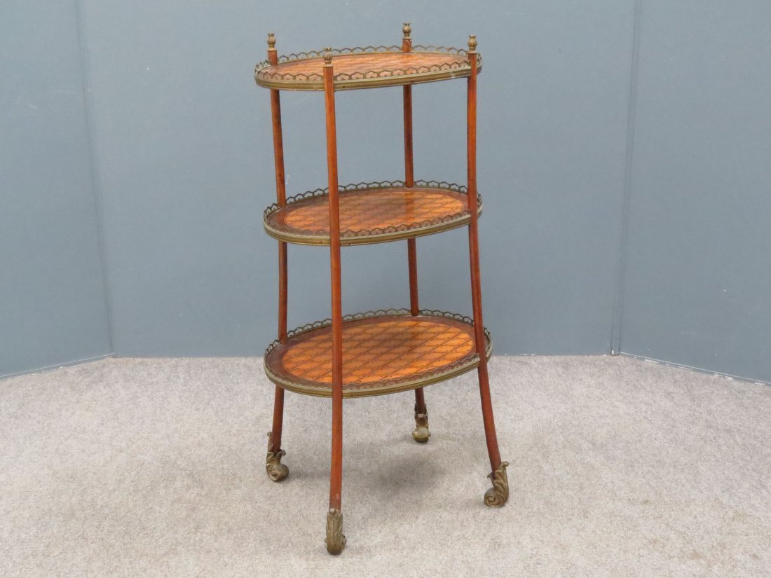 FRENCH PARQUETRY INLAID FRUITWOOD 3-TIER: FRENCH PARQUETRY INLAID FRUITWOOD 3-TIER STAND WITH ORMOLU MOUNTS, 19TH CENTURY. HEIGHT 33"; WIDTH 15"