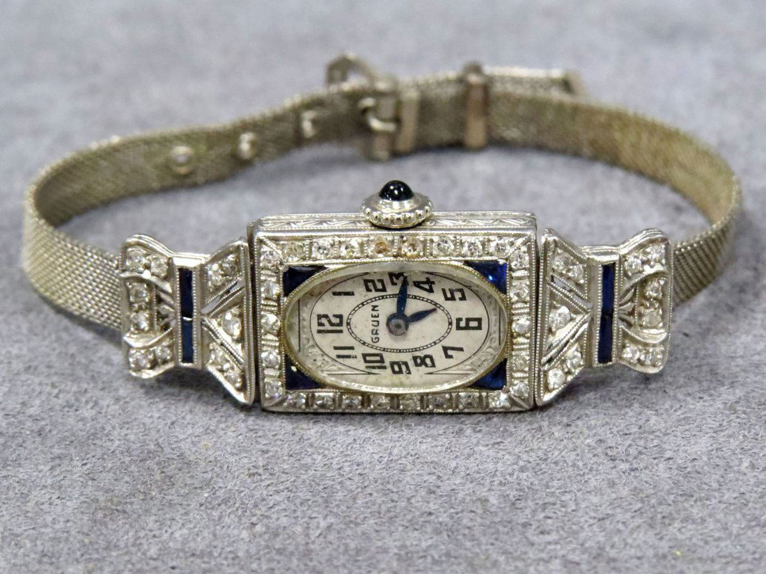 ART DECO PLATINUM DIAMOND GRUEN WATCH: ART DECO PLATINUM AND SINGLE-CUT DIAMOND GRUEN 15-JEWEL WRISTWATCH WITH GOLD FILLED MESH BAND. APPROXIMATE DIAMOND TWT 0.72 CT; GROSS WEIGHT 17.3 GRAMS (WATCH NOT WORKING)