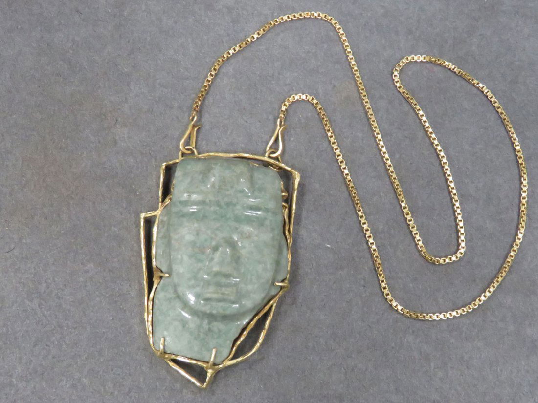18K YELLOW GOLD FRAMED AND CARVED GREEN HARDSTONE (1 of 2)