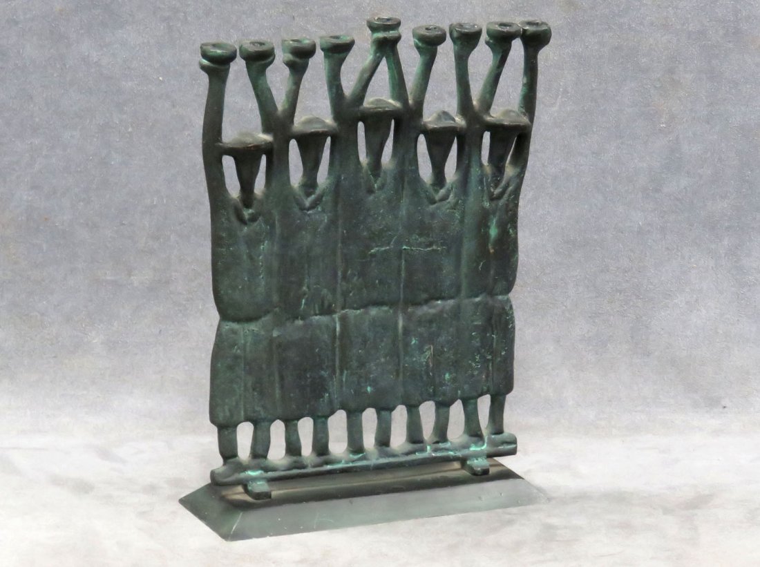 RUTH BLOCK (AMERICAN SCHOOL 20TH CENTURY) BRONZE: RUTH BLOCK (AMERICAN SCHOOL 20TH CENTURY) PATINATED BRONZE FIGURAL MENORAH, SIGNED. HEIGHT 10 3/4"
