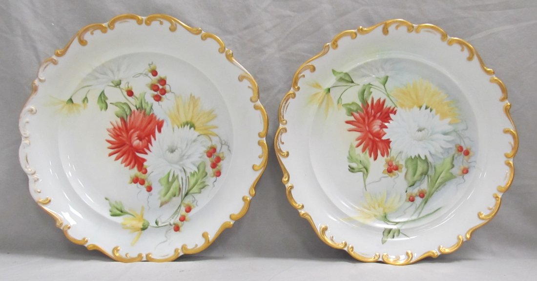 PAIR HAND DECORATED BAVARIAN PORCELAIN CHARGERS: PAIR HAND DECORATED BAVARIAN PORCELAIN CHARGERS, SIGNED M. SWOYER. DIAMETER 13"