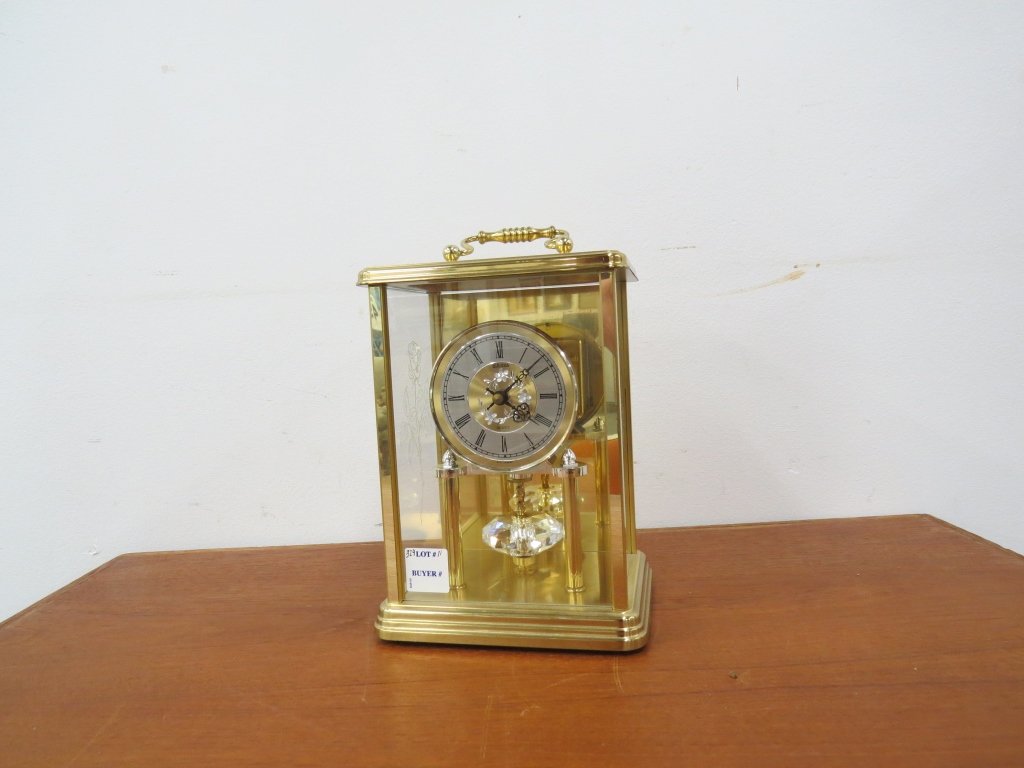 BULOVA BRASS CRYSTAL REGULATOR: BULOVA BRASS CRYSTAL REGULATOR WITH SWAROVSKI CRYSTAL PENDULUM. HEIGHT 10 1/2"