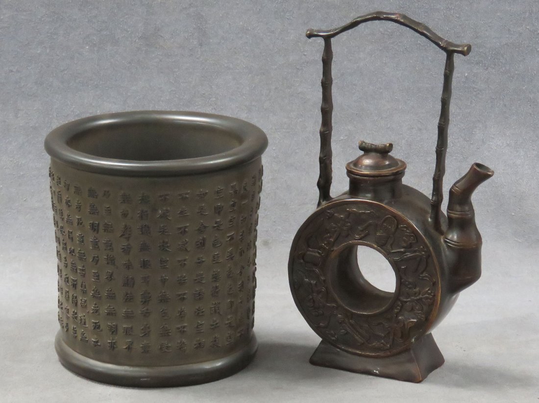 LOT (2) CHINESE INCLUDING BRONZE "PRECIOUS OBJECTS: LOT (2) CHINESE INCLUDING BRONZE "PRECIOUS OBJECTS" TEA POT, HEIGHT 8 1/2"; I'HSING WARE BRUSH POT WITH CALLIGRAPHY, HEIGHT 5 1/2"