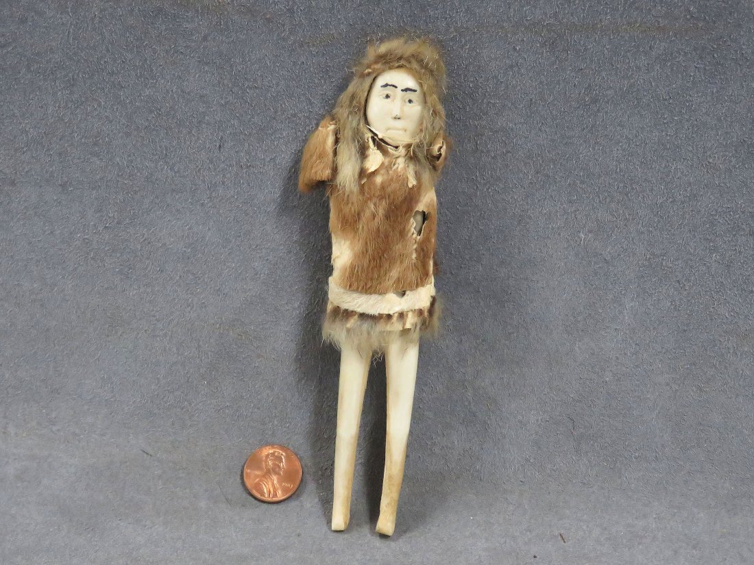 NORTHWEST COAST INUIT BONE DOLL. CIRCA 1910: NORTHWEST COAST INUIT BONE DOLL. CIRCA 1910. HEIGHT 6"