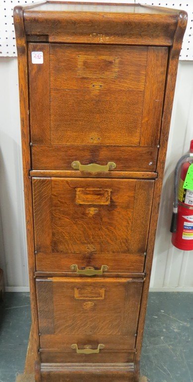 VINTAGE OAK FILE CABINET. HEIGHT 48"; WIDTH 14 1/2" (1 of 2)