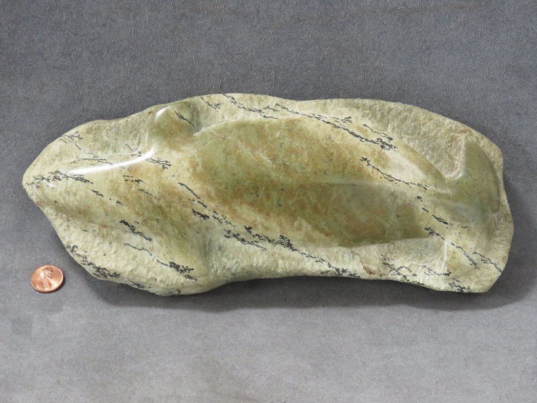 NORTHWEST COAST CARVED SOAPSTONE WHALE RELIEF FIGURE.: NORTHWEST COAST CARVED SOAPSTONE WHALE RELIEF FIGURE. LENGTH 11"