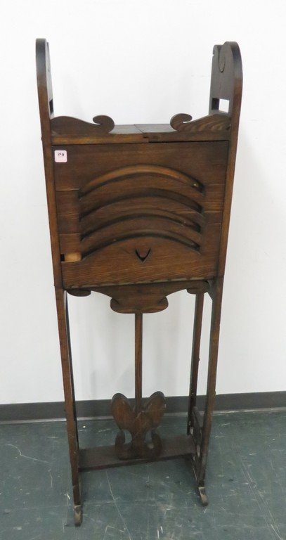 ARTS AND CRAFTS CARED OAK MECHANICAL BAR CABINET.: ARTS AND CRAFTS CARED OAK MECHANICAL BAR CABINET. HEIGHT 56"; WIDTH 17 1/2"; (IMPERFECTION)