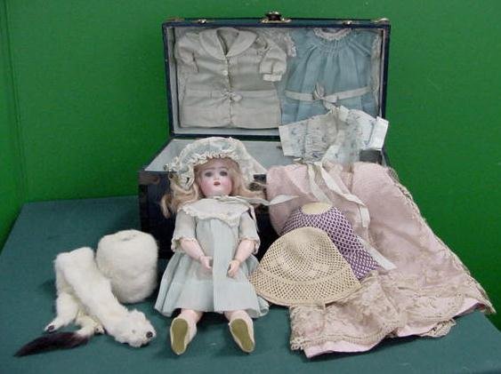 GERMAN K*R BISQUE HEAD DOLL WITH CLOTHING/CASE