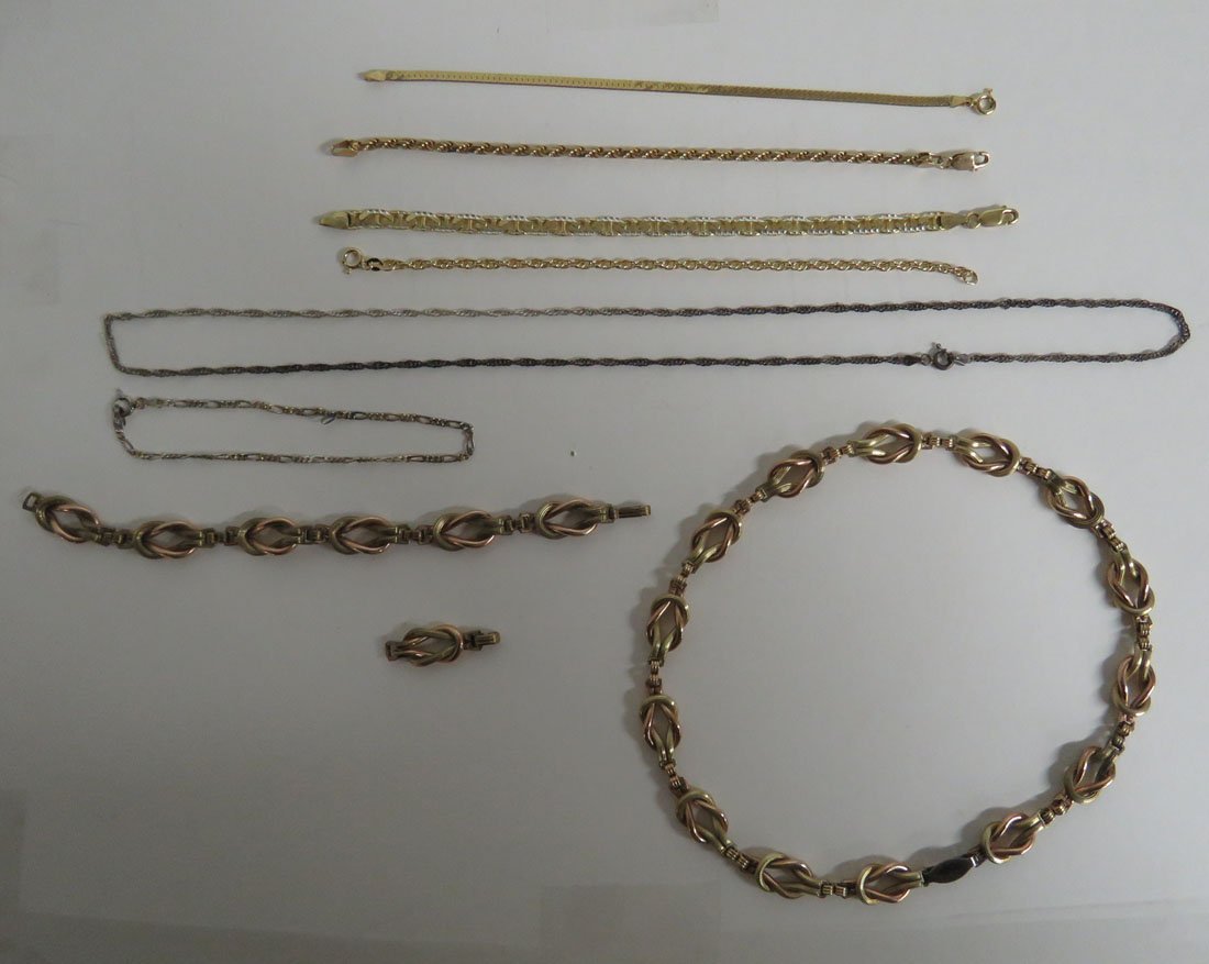 LOT ASSORTED STERLING CHAIN BRACELETS AND CHARMS AND: LOT ASSORTED STERLING CHAIN BRACELETS AND CHARMS AND GOLD FILLED OVER STERLING AND COPPER HEAVING LINK NECKLACE AND BRACELET. GROSS WEIGHT 3.13 OZT