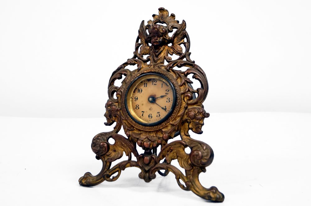 VINTAGE GILBERT GILT CAST IRON SHELF CLOCK, C.1890. (1 of 2)