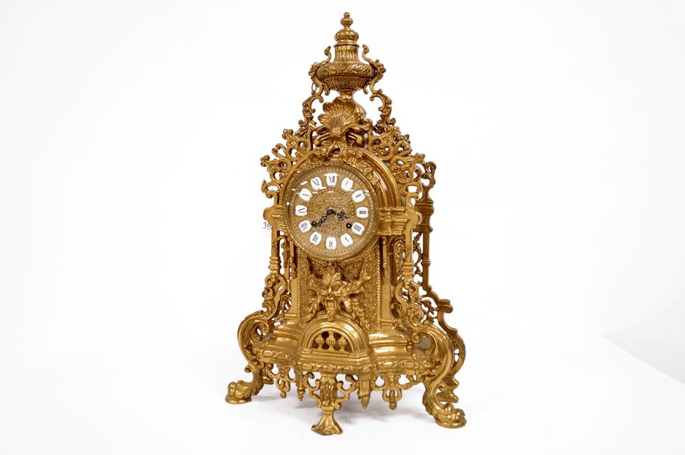 FRENCH STYLE BRASS SHELF CLOCK. HEIGHT 24" (1 of 2)