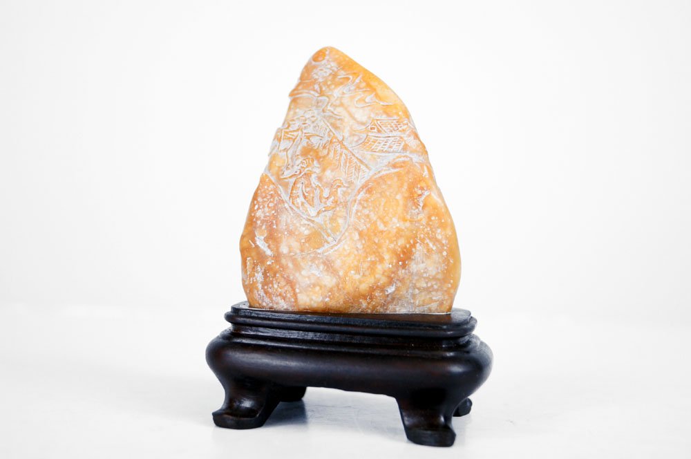CHINESE TIEN WANG CARVED STONE BOLDER WITH FIGURE IN: CHINESE TIEN WANG CARVED STONE BOLDER WITH FIGURE IN LANDSCAPE. HEIGHT 3" WITH STAND