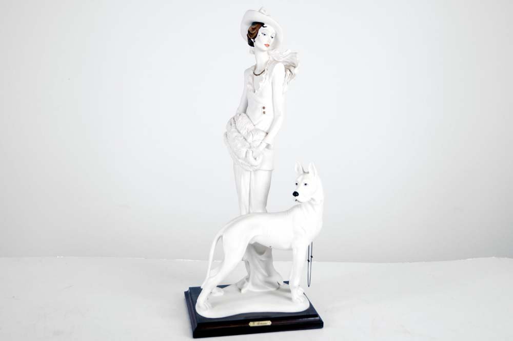 GIORGIO ARMANI (ITALY 20TH CENTURY), CAST RESIN FIGURE: GIORGIO ARMANI (ITALY 20TH CENTURY), CAST RESIN FIGURE OF A WOMAN AND GREAT DANE, C.1987. HEIGHT 18 1/2"