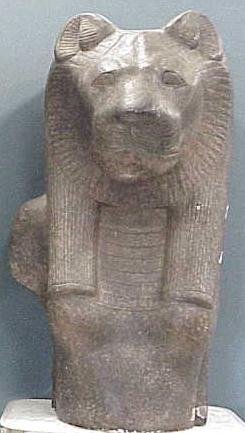 EGYPTIAN STYLE CAST STONE CARTONAGE: EGYPTIAN STYLE CAST STONE CARTONAGE. HEIGHT 35". **DUE TO THE LOTS SIZE AND OR FRAGILITY, STANDARD IN HOUSE SHIPPING IS NOT AVAILABLE ON THIS ITEM. FOR YOUR CONVENIENCE, THE GALLERY CAN PROVIDE YOU WI