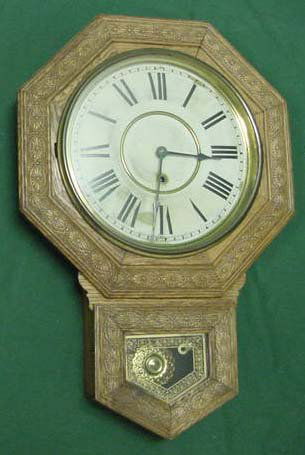 VINTAGE SESSIONS PRESSED OAK REGULATOR CLOCK: VINTAGE SESSIONS PRESSED OAK REGULATOR WALL CLOCK, C.1900. HEIGHT 26" **DUE TO THE SIZE AND OR FRAGILITY OF THIS LOT, STANDARD IN-HOUSE SHIPPING IS NOT AVAILABLE. CONTACT THE GALLERY FOR A LIST OF TRU