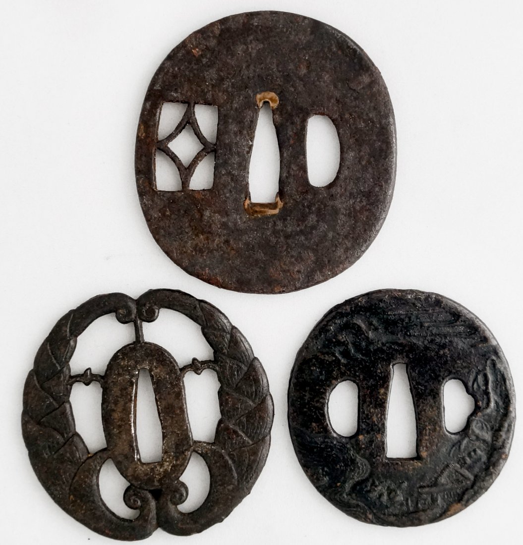 LOT (3) JAPANESE TETSU (IRON) TSUBAS INCLUDING (2): LOT (3) JAPANESE TETSU (IRON) TSUBAS INCLUDING (2) SUKASHI, EDO, 3 X 2 3/4" AND DIAMETER 2 3/4"; (1) TANTO, EDO, 2 5/8 X 2 1/2"