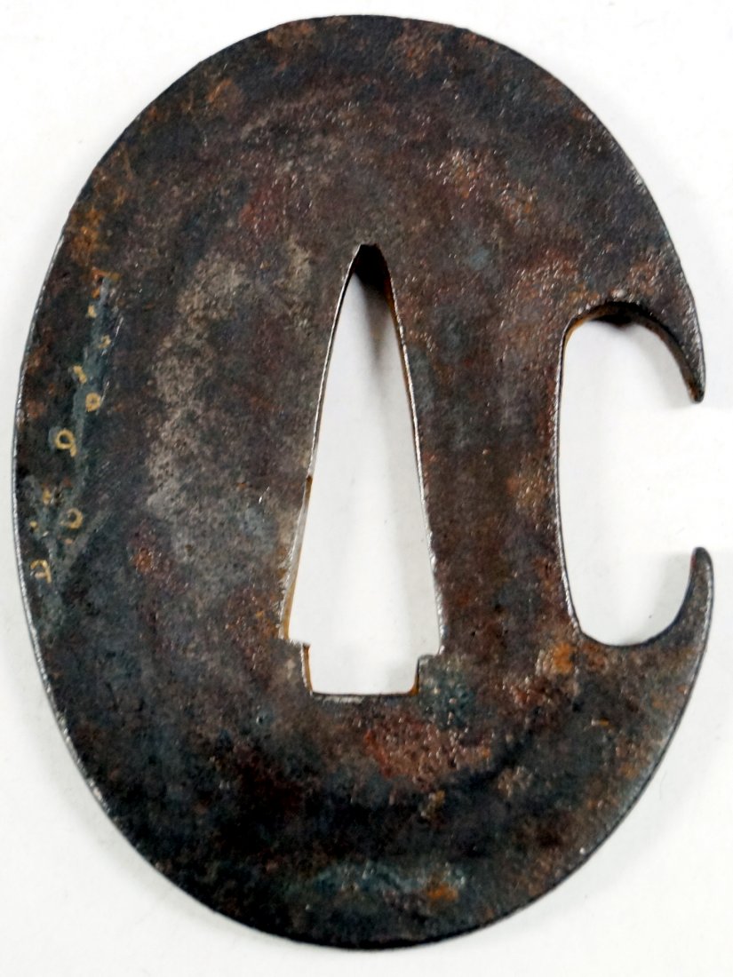 ATTRIBUTED TO MUTSU MASAHISA, TETSU (IRON) SILVER: ATTRIBUTED TO MUTSU MASAHISA, TETSU (IRON) SILVER SUZI-ZOGAN INLAID TANTO TSUBA, SIGNED. 2 1/4 X 1 5/8"