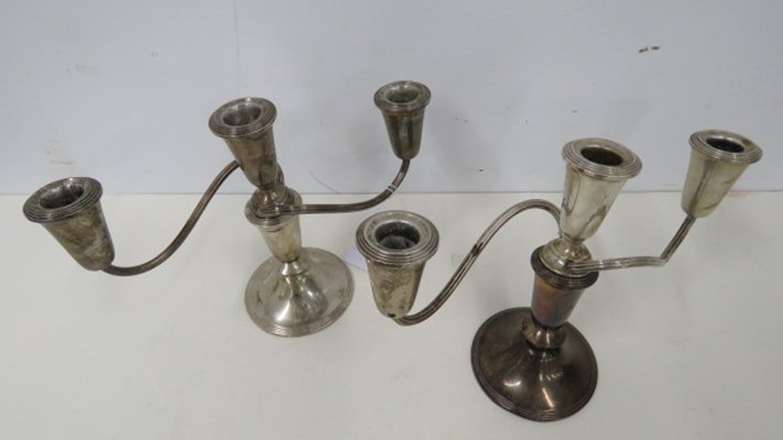 PAIR WEIGHTED STERLING SILVER CANDELABRAS. HEIGHT 7: PAIR WEIGHTED STERLING SILVER CANDELABRAS. HEIGHT 7 3/8" (REPAIRED)