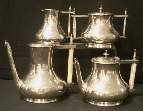 VICTORIAN SILVER PLATE PRESENTATION SERVICE: LOT (4) VICTORIAN SILVER PLATE PRESENTATION COFFEE/TEA SERVICE ENGRAVED "DR. CORNELIUS BELL, 1866". HEIGHT 8 1/2"