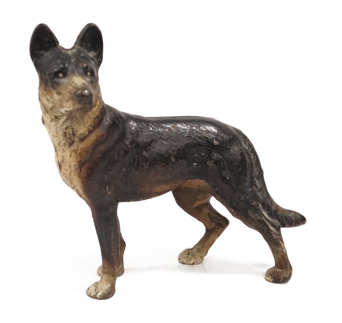 VINTAGE PAINTED CAST IRON GERMAN SHEPARD DOOR STOP. (1 of 1)