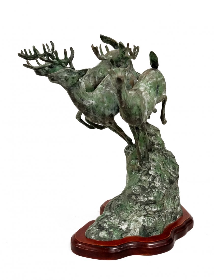 AMERICAN SCHOOL (20TH CENTURY), BRONZE, RUNNING STAGS (1 of 2)