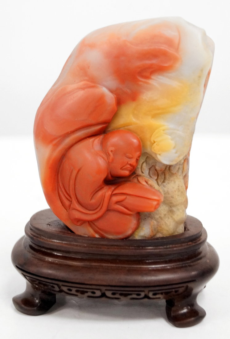 CHINESE CARVED FIGURE OF A MONK READING AMONG CLOUDS.: CHINESE CARVED FIGURE OF A MONK READING AMONG CLOUDS. HEIGHT 3"