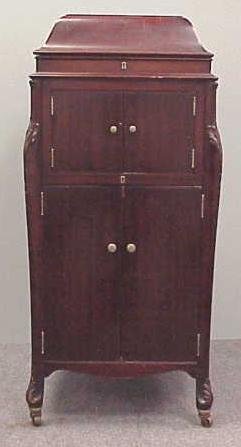 VICTOR VICTROLA VV-XIV MAHOGANY FLOOR MODEL: VICTOR VICTROLA VV-XIV MAHOGANY FLOOR MODEL RECORD PLAYER SERIAL #63687E WITH RECORDS. HEIGHT 48"; WIDTH 22" (MINOR SURFACE SCRATCHES) **DUE TO THE LOTS SIZE AND OR FRAGILITY, STANDARD IN HOUSE SHIPPI