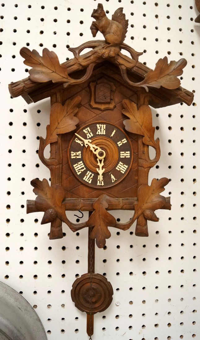 GERMAN BLACK FOREST CARVED CUCKOO CLOCK. HEIGHT 14" (1 of 2)