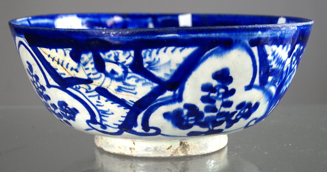 MIDDLE EASTERN FAIENCE DECORATED BOWL, 16/17TH CENTURY. (1 of 2)
